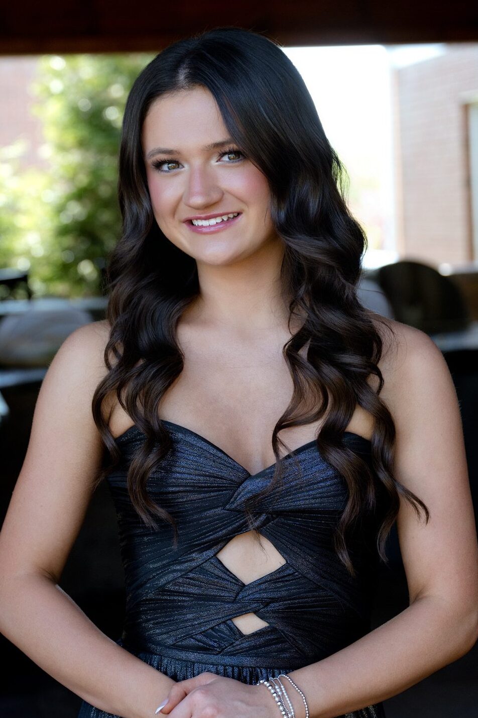 High school senior having professional hair and makeup before her Pittsburgh senior portrait session.
